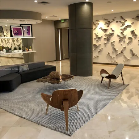 a view of a living room with a sink