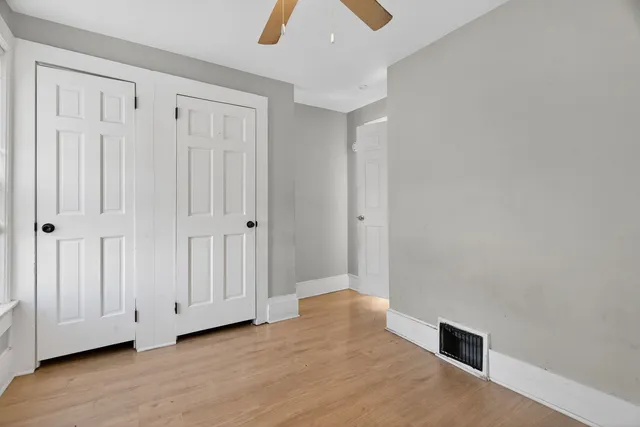 a view of cabinets and window