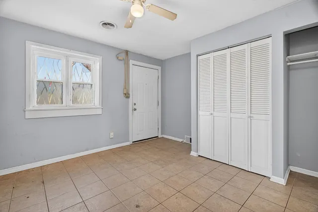 a kitchen with granite countertop cabinets and steel stainless steel appliances
