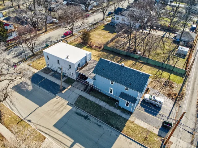 an aerial view of residential house with parking space