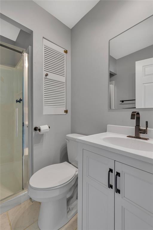 1301 Bechtel Street Monaca, PA 15061 - Photo 18 of 36 a bathroom with a sink a toilet and shower