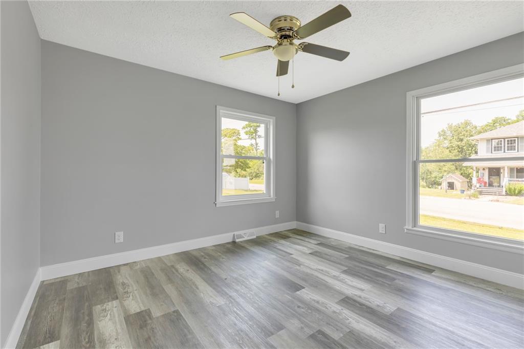 1301 Bechtel Street Monaca, PA 15061 - Photo 19 of 36 a view of an empty room and a window