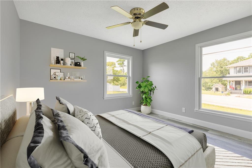 1301 Bechtel Street Monaca, PA 15061 - Photo 20 of 36 a bedroom with a large bed and a window