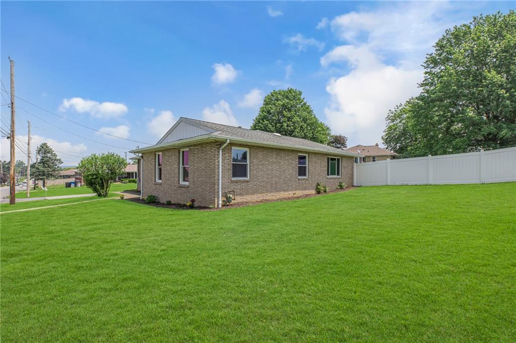 1301 Bechtel Street Monaca, PA 15061 - Photo 2 of 36 a view of a backyard with a garden