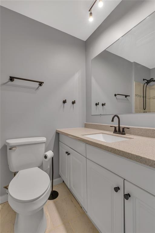1301 Bechtel Street Monaca, PA 15061 - Photo 22 of 36 a bathroom with a toilet sink and mirror