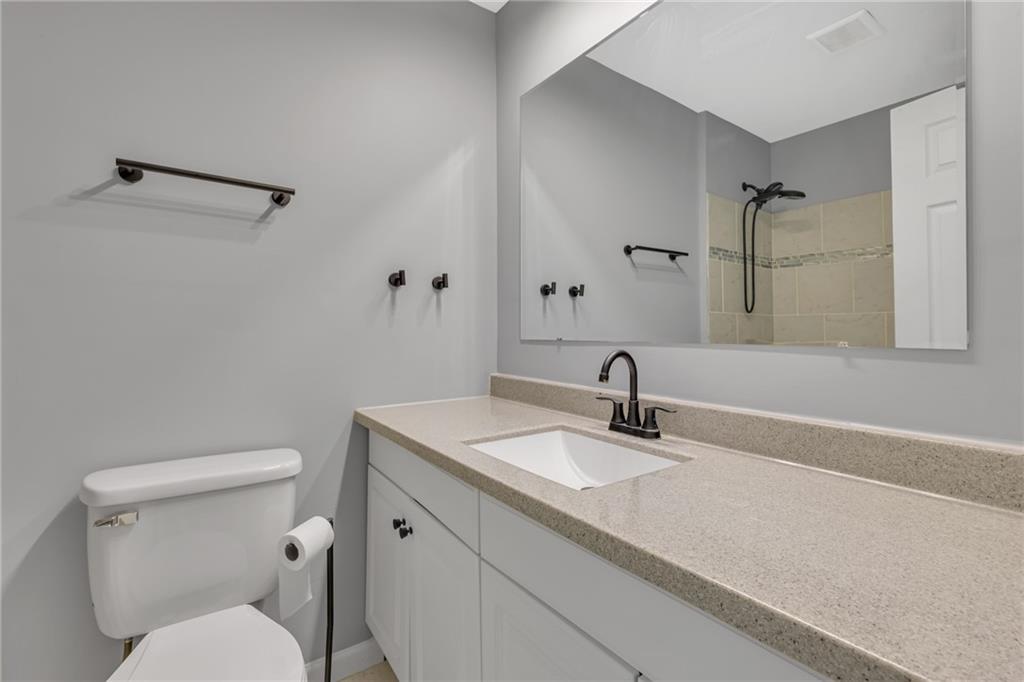1301 Bechtel Street Monaca, PA 15061 - Photo 23 of 36 a bathroom with a sink toilet and shower