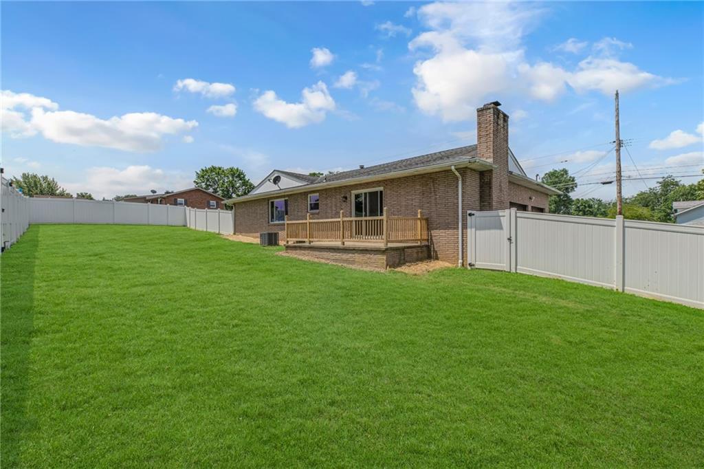 1301 Bechtel Street Monaca, PA 15061 - Photo 33 of 36 a front view of a house with a yard