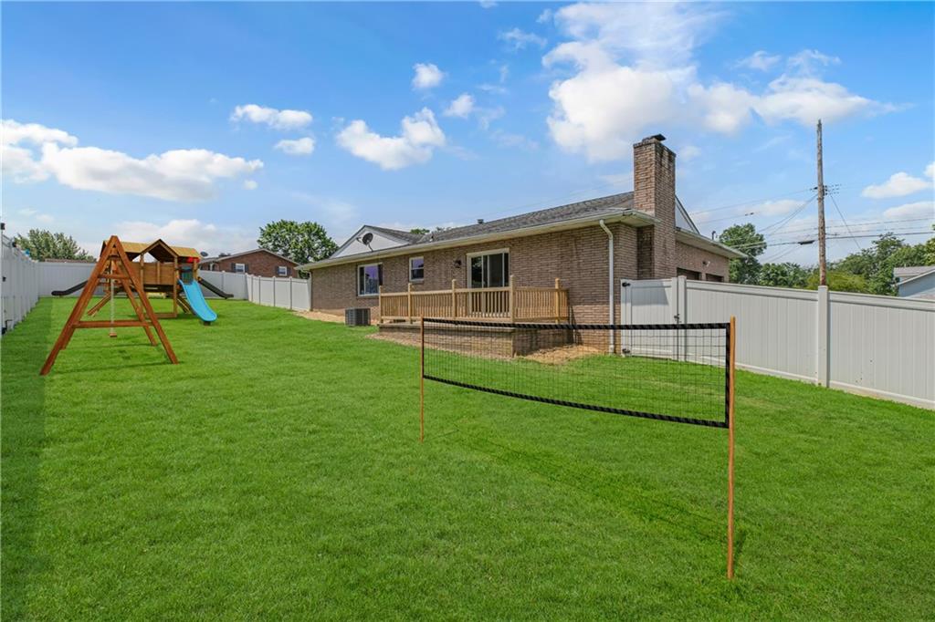 1301 Bechtel Street Monaca, PA 15061 - Photo 34 of 36 a view of a house with a backyard