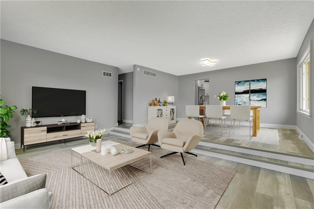 1301 Bechtel Street Monaca, PA 15061 - Photo 4 of 36 a living room with furniture and a flat screen tv