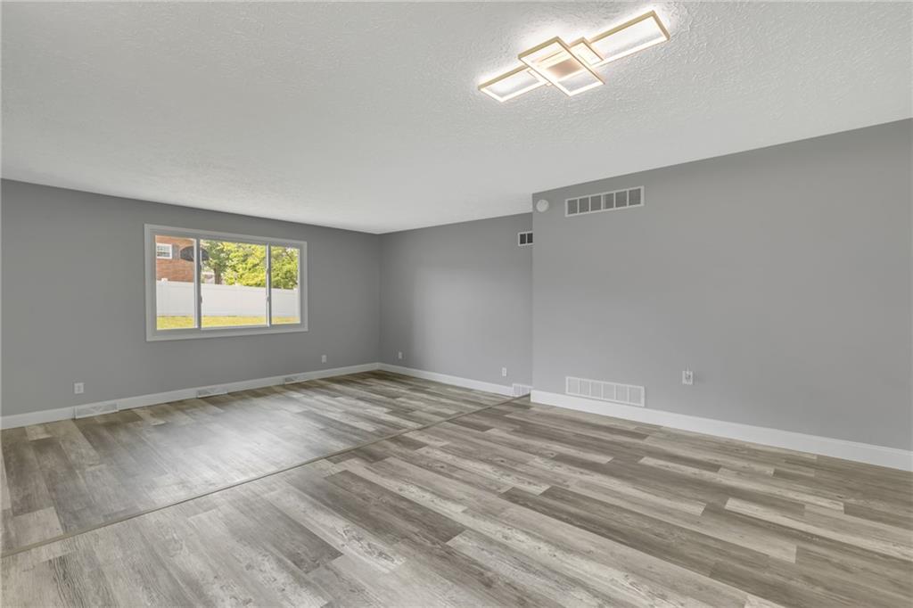 1301 Bechtel Street Monaca, PA 15061 - Photo 6 of 36 a view of empty room with window