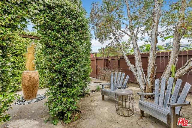 a view of yard with patio and sitting area