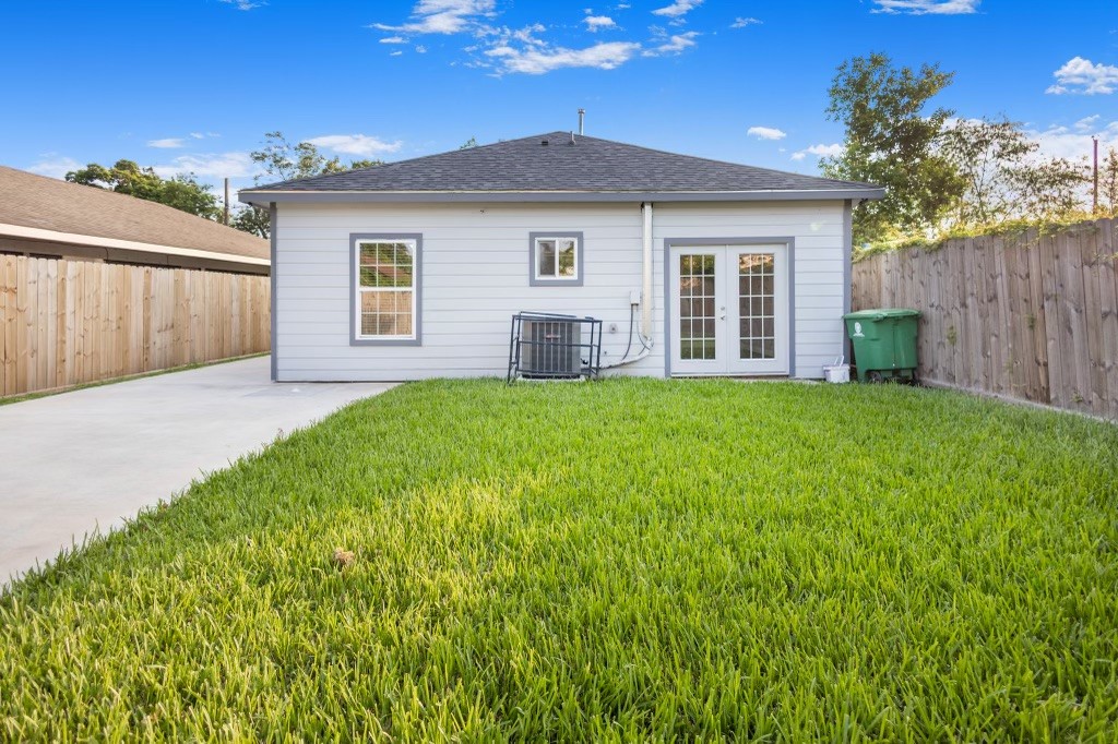 3234 Berry Street Houston, TX 77004 - Photo 30 of 34 a view of a house with a yard and pathway