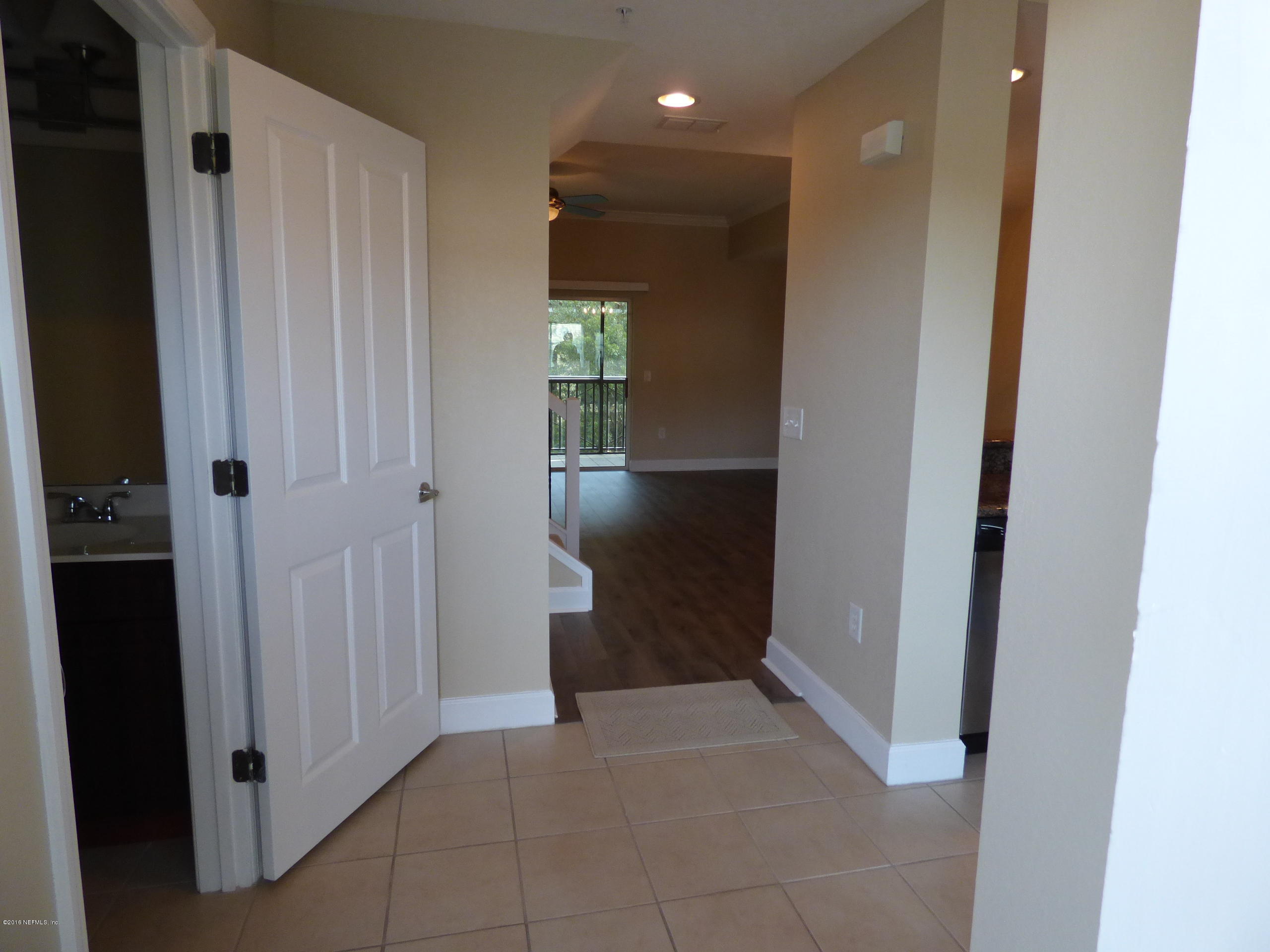 9745 Touchton Road, Unit 425 Jacksonville, FL 32246 - Photo 2 of 22 Entry Foyer with 1/2 Bath