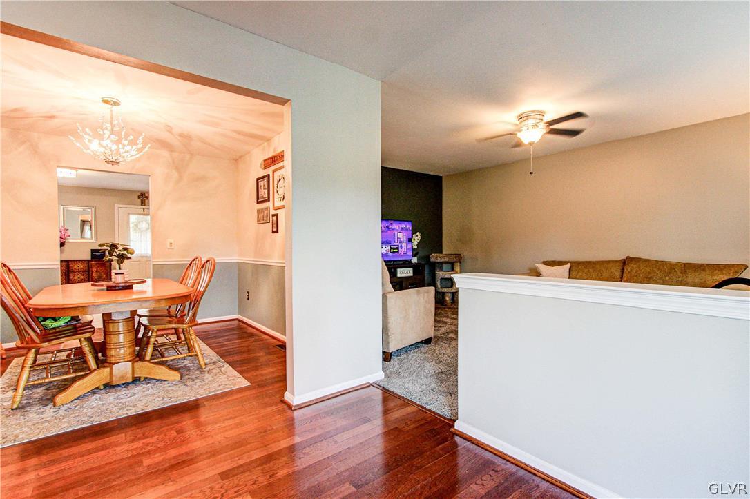 2023 Clover Mill Road Quakertown, PA 18951 - Photo 12 of 48 a view of a dining room with furniture and wooden floor