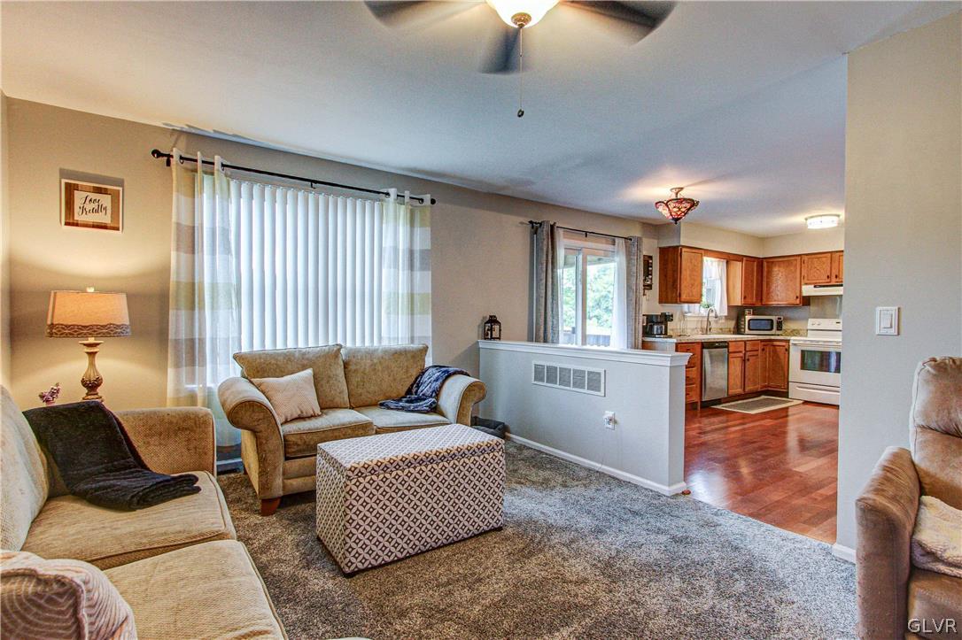 2023 Clover Mill Road Quakertown, PA 18951 - Photo 21 of 48 a living room with furniture and kitchen view
