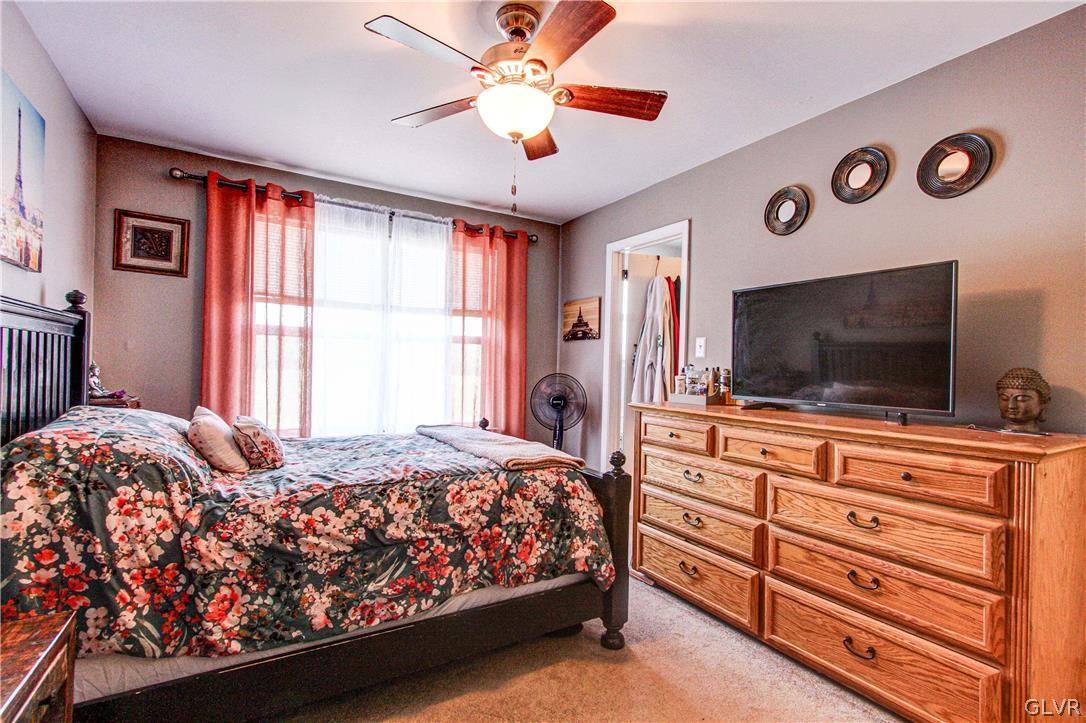 2023 Clover Mill Road Quakertown, PA 18951 - Photo 29 of 48 a bedroom with a bed and a flat screen tv