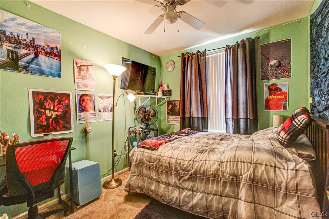 2023 Clover Mill Road Quakertown, PA 18951 - Photo 34 of 48 a bedroom with a bed and a flat screen tv