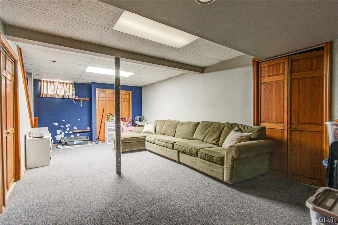 2023 Clover Mill Road Quakertown, PA 18951 - Photo 36 of 48 a living room with furniture and a large window