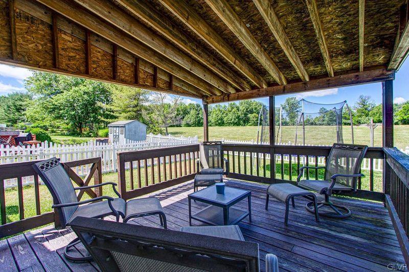 2023 Clover Mill Road Quakertown, PA 18951 - Photo 39 of 48 a view of a two chairs on the deck