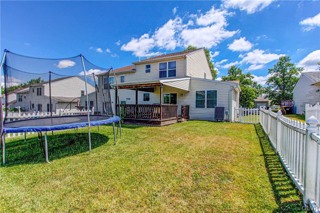2023 Clover Mill Road Quakertown, PA 18951 - Photo 43 of 48 a view of a house with a yard patio and swimming pool