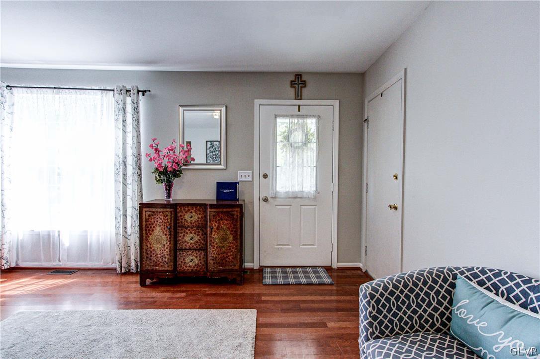2023 Clover Mill Road Quakertown, PA 18951 - Photo 5 of 48 a living room with a rug and a window