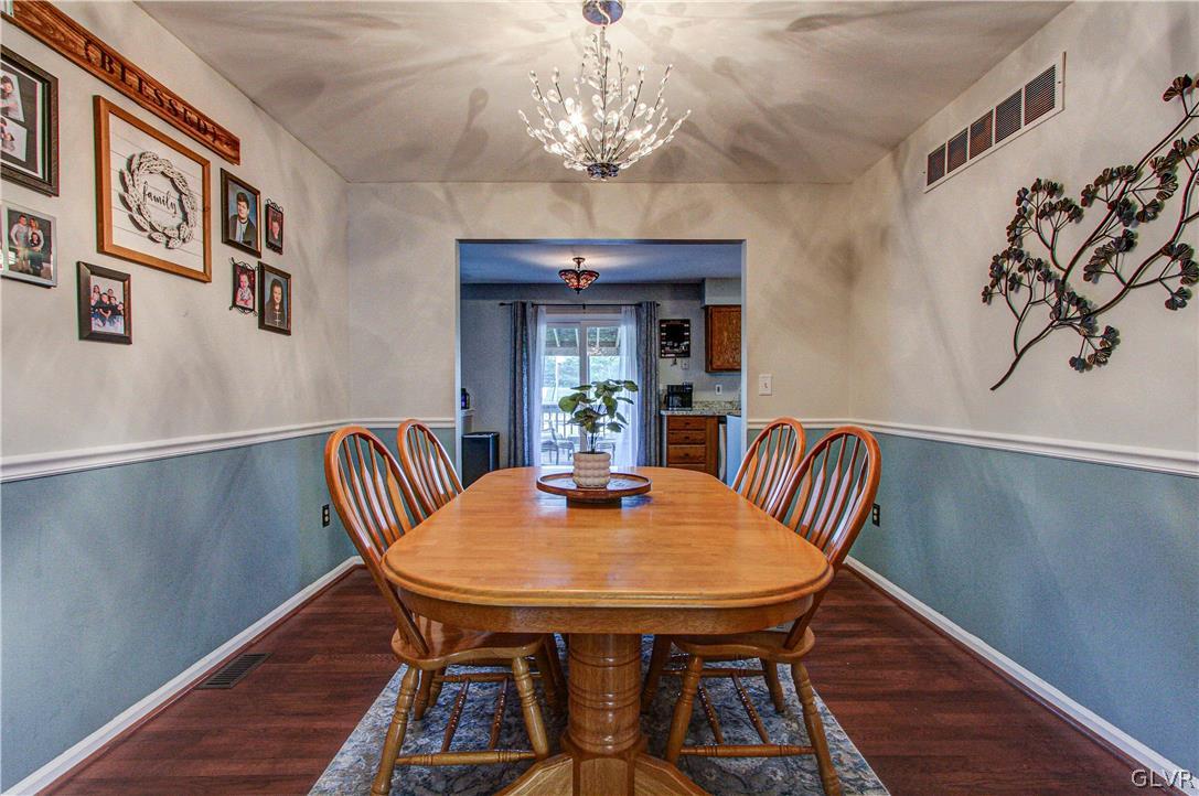 2023 Clover Mill Road Quakertown, PA 18951 - Photo 10 of 48 a view of a dining room with furniture window and wooden floor