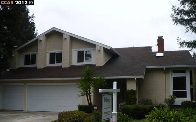 310 Salem Court San Ramon, CA 94583 - Photo 1 of 1 a front view of a house with garden