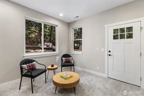 a view of a livingroom with furniture and window