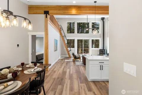 a view of a dining room with furniture window and outside view