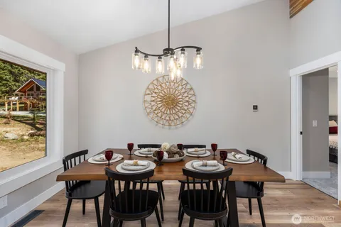a view of a dining room and chandelier