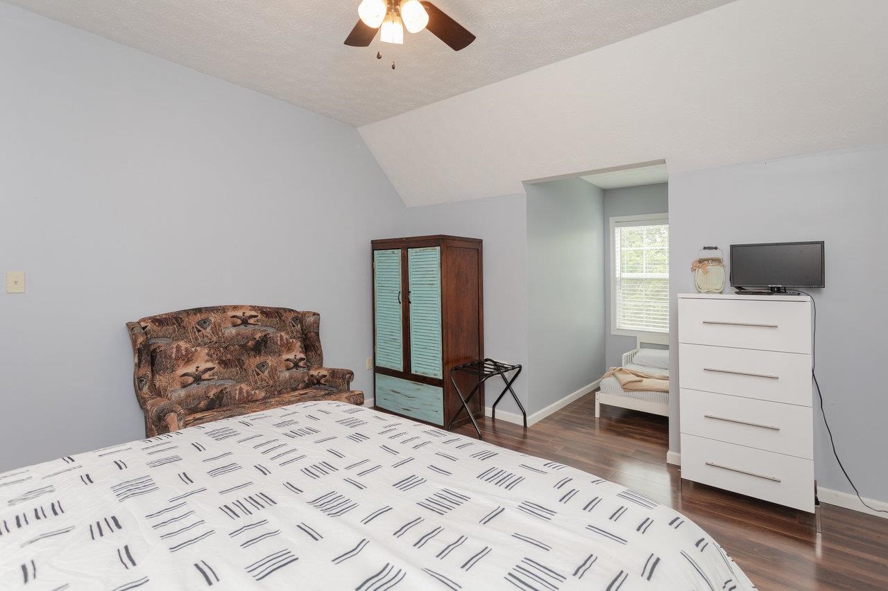 159 Park View Shenandoah, VA 22849 - Photo 33 of 70 a bedroom with a bed and wooden floor