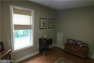 2684 Mt Ventus Road Manchester, MD 21102 - Photo 12 of 23 a view of a workspace with furniture and a window