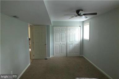 2684 Mt Ventus Road Manchester, MD 21102 - Photo 14 of 23 an empty room with a empty space and windows