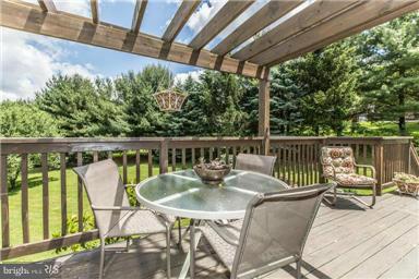 2684 Mt Ventus Road Manchester, MD 21102 - Photo 19 of 23 a view of a chairs and table on the deck