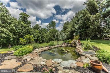 2684 Mt Ventus Road Manchester, MD 21102 - Photo 20 of 23 a view of a lake with large trees