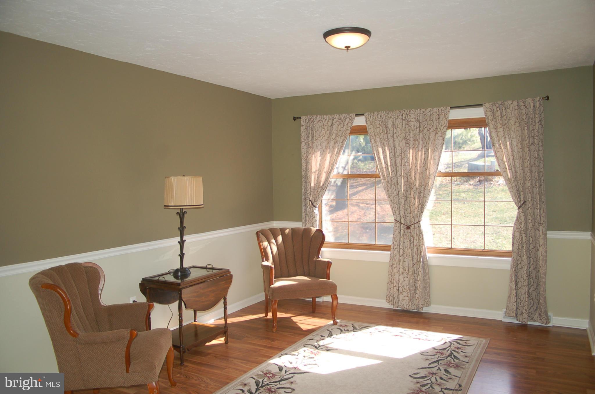 2684 Mt Ventus Road Manchester, MD 21102 - Photo 3 of 23 a living room with furniture and a window
