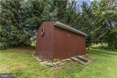 2684 Mt Ventus Road Manchester, MD 21102 - Photo 23 of 23 a backyard of a house with lots of green space