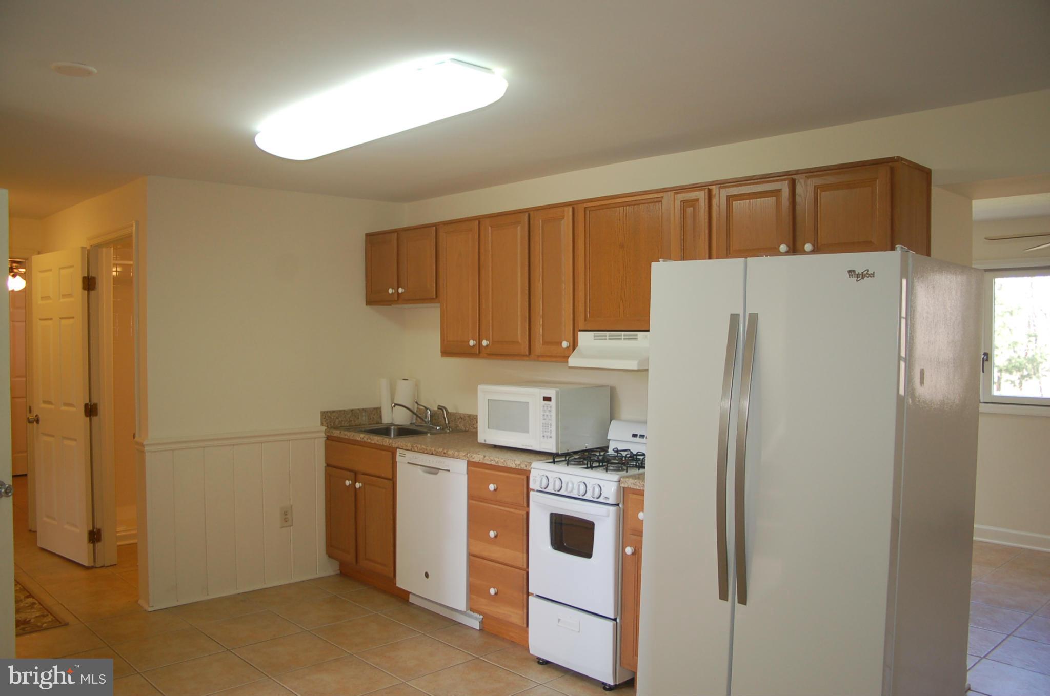 2684 Mt Ventus Road Manchester, MD 21102 - Photo 6 of 23 a kitchen with stainless steel appliances a refrigerator and a stove