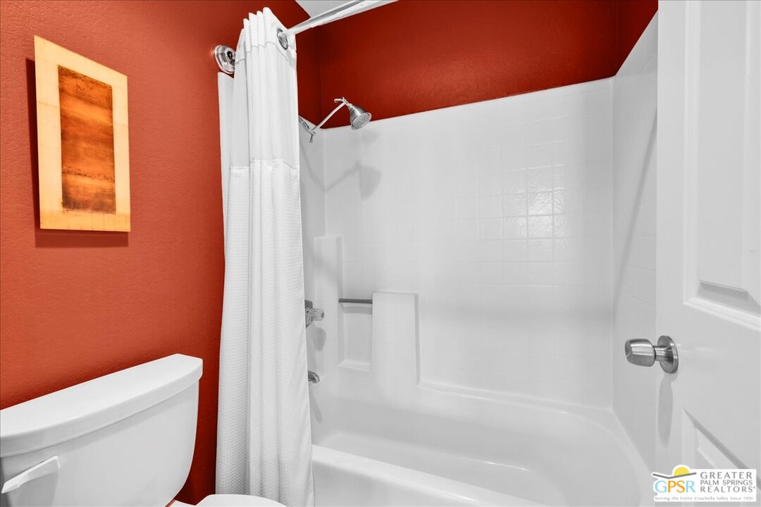 401 El Cielo Road, Unit 147 Palm Springs, CA 92262 - Photo 23 of 44 a bathroom with a shower and a toilet