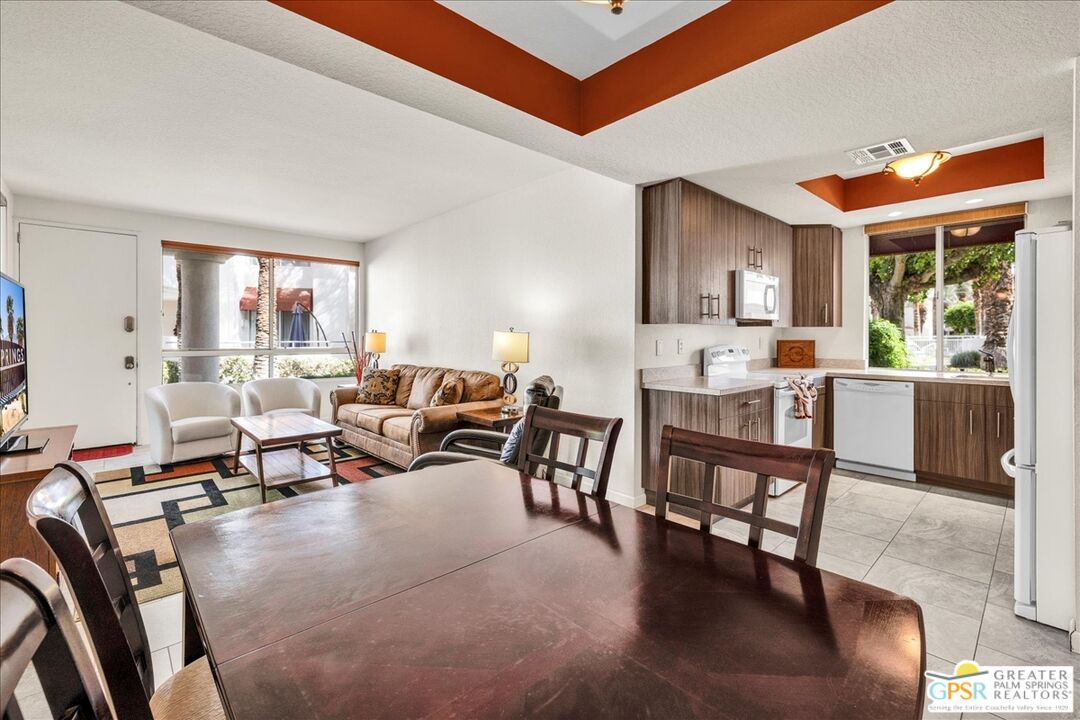 401 El Cielo Road, Unit 147 Palm Springs, CA 92262 - Photo 6 of 44 a living room with furniture and a large window
