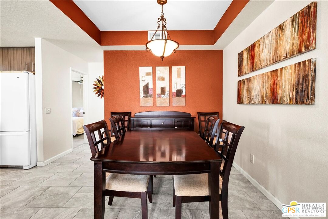 401 El Cielo Road, Unit 147 Palm Springs, CA 92262 - Photo 7 of 44 a view of a dining room with furniture and window