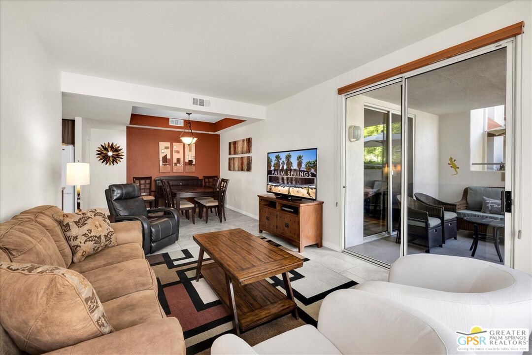 401 El Cielo Road, Unit 147 Palm Springs, CA 92262 - Photo 10 of 44 a living room with furniture and a window