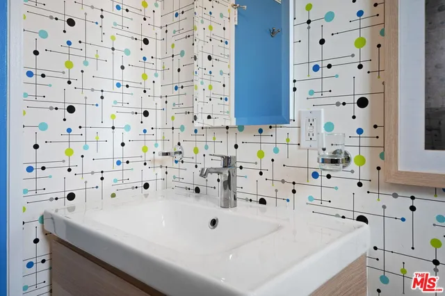 a bathroom with a sink and a bathtub