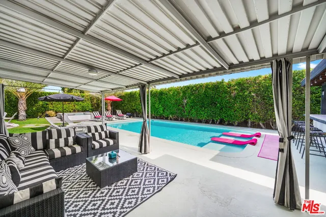 a view of yard with patio