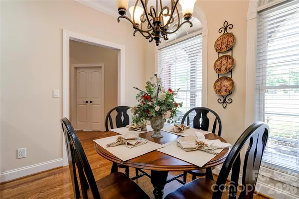 a view of a dining room a table and chairs in a room