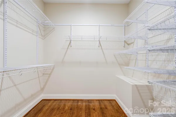a view of a room with racks on the wall