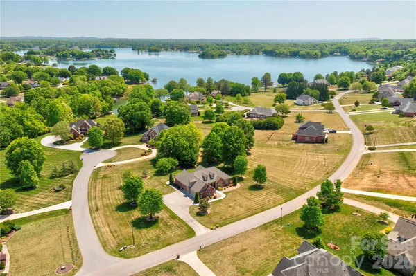 a view of a lake with a house
