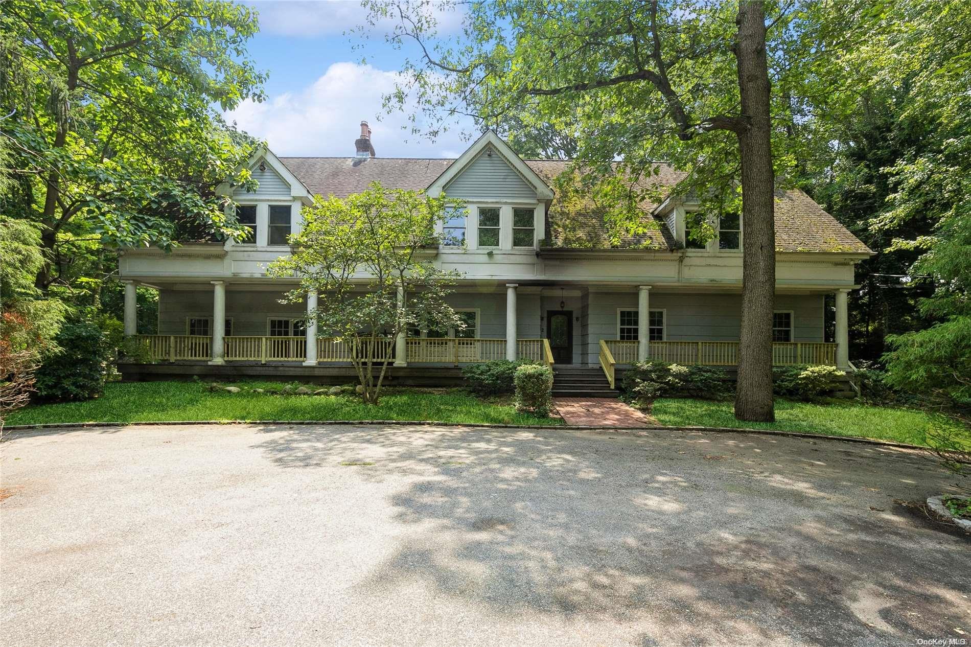 2 Springwood Path Syosset, NY 11791 - Photo 1 of 1 front view of house with a yard