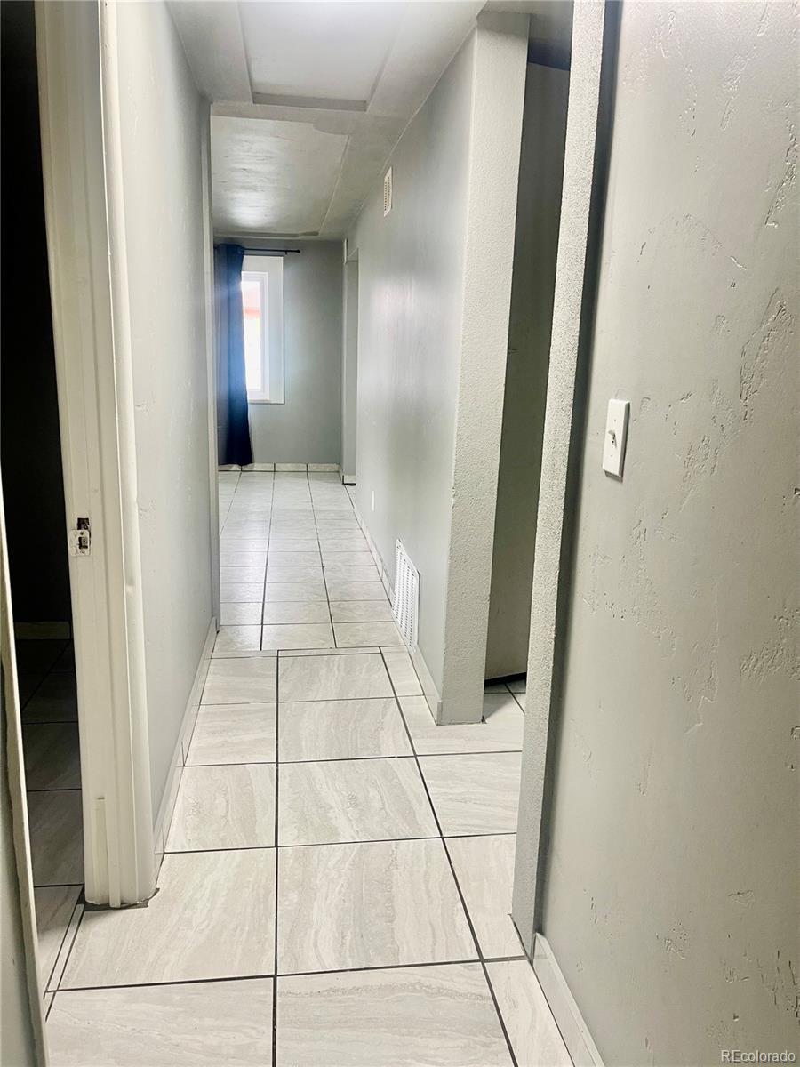 4332 West Nevada Place Denver, CO 80219 - Photo 14 of 14 a view of a hallway