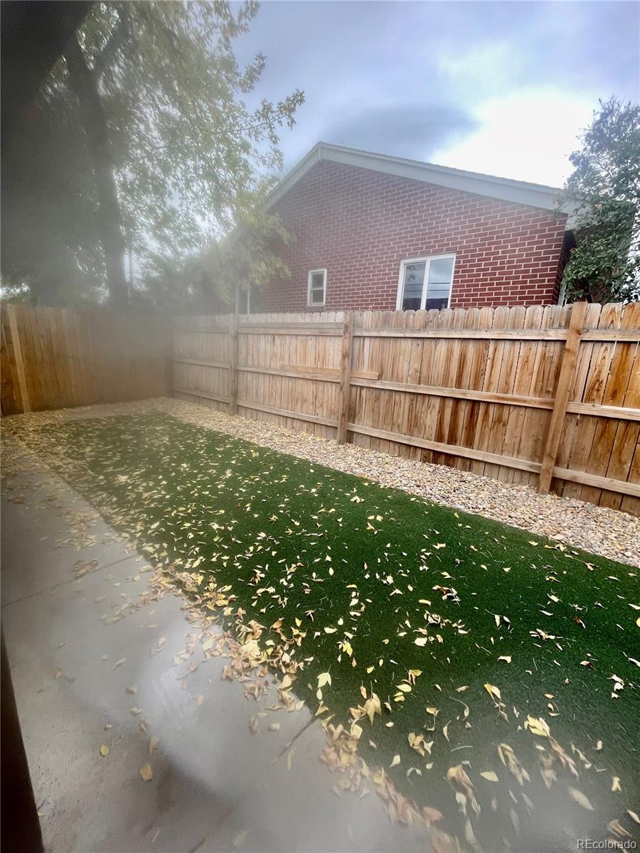 4332 West Nevada Place Denver, CO 80219 - Photo 4 of 14 a view of a backyard